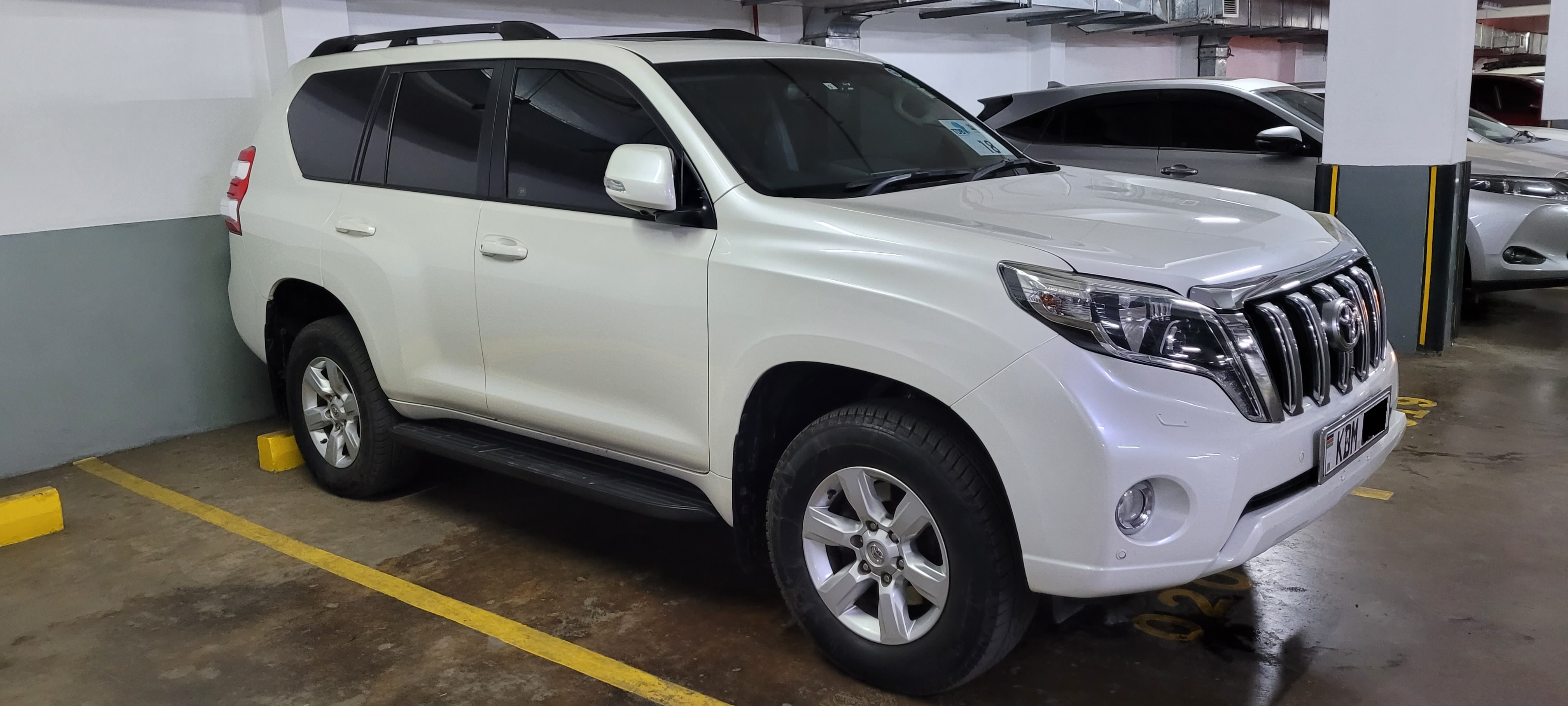 Prado parked, side view